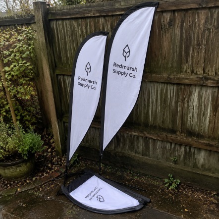 Branded teardrop flags with logo